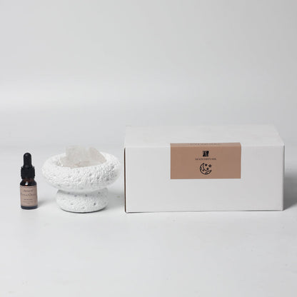 The White Moon Diffuser next to packaging