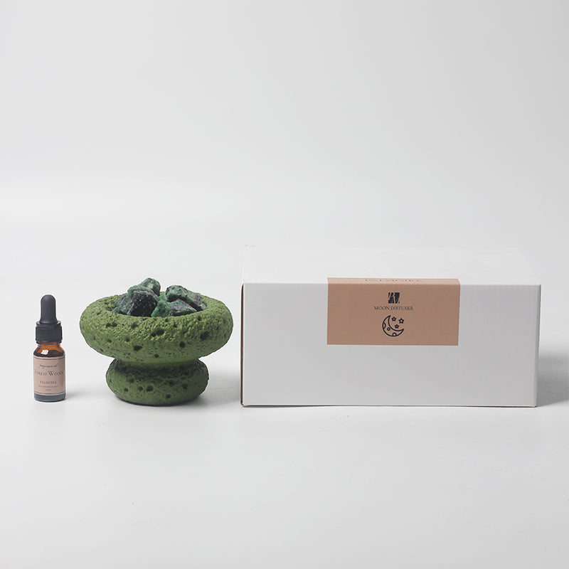 The Green Moon Diffuser with its packaging