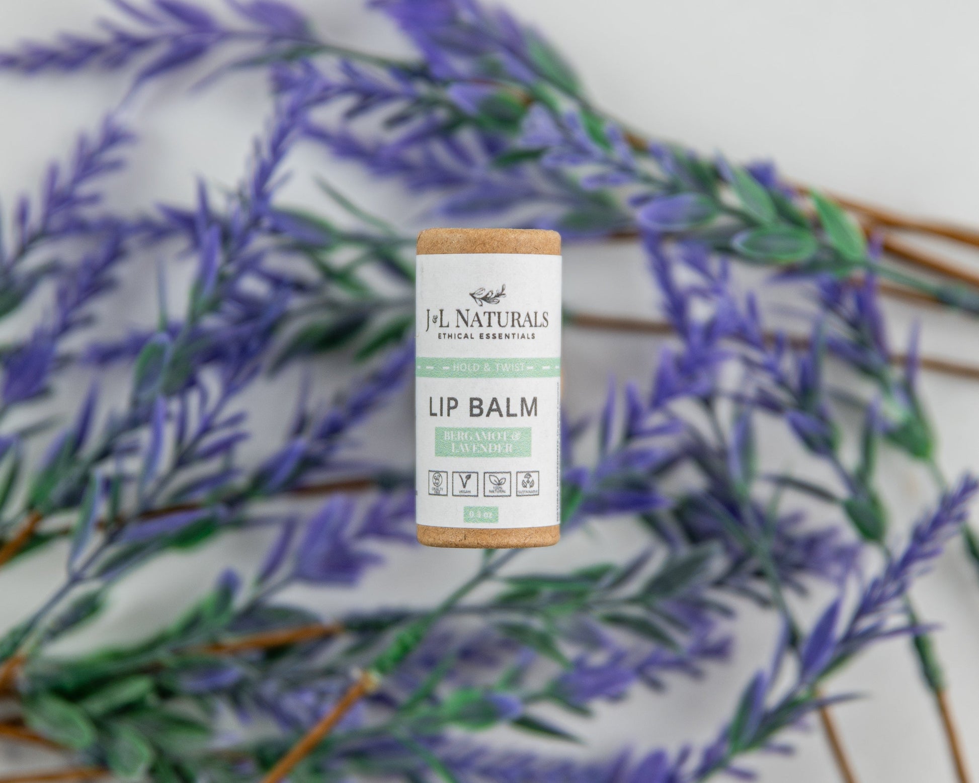 Lip Balm Bergamot and Lavender on a background of fresh lavender